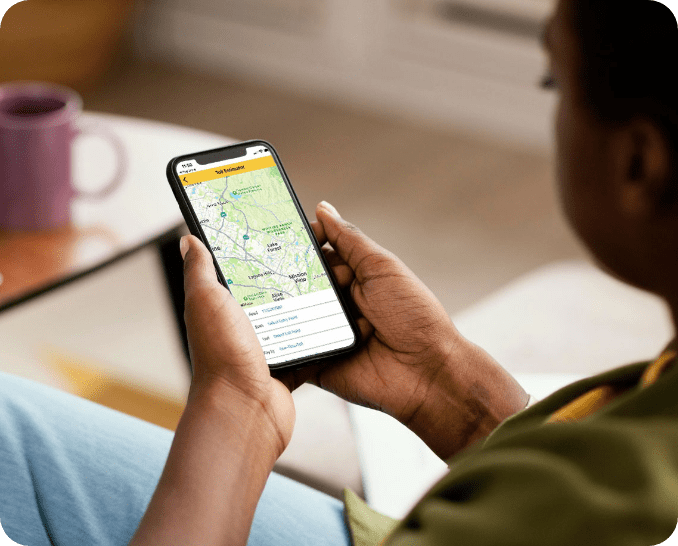 Women using The Toll Roads App on their mobile phone